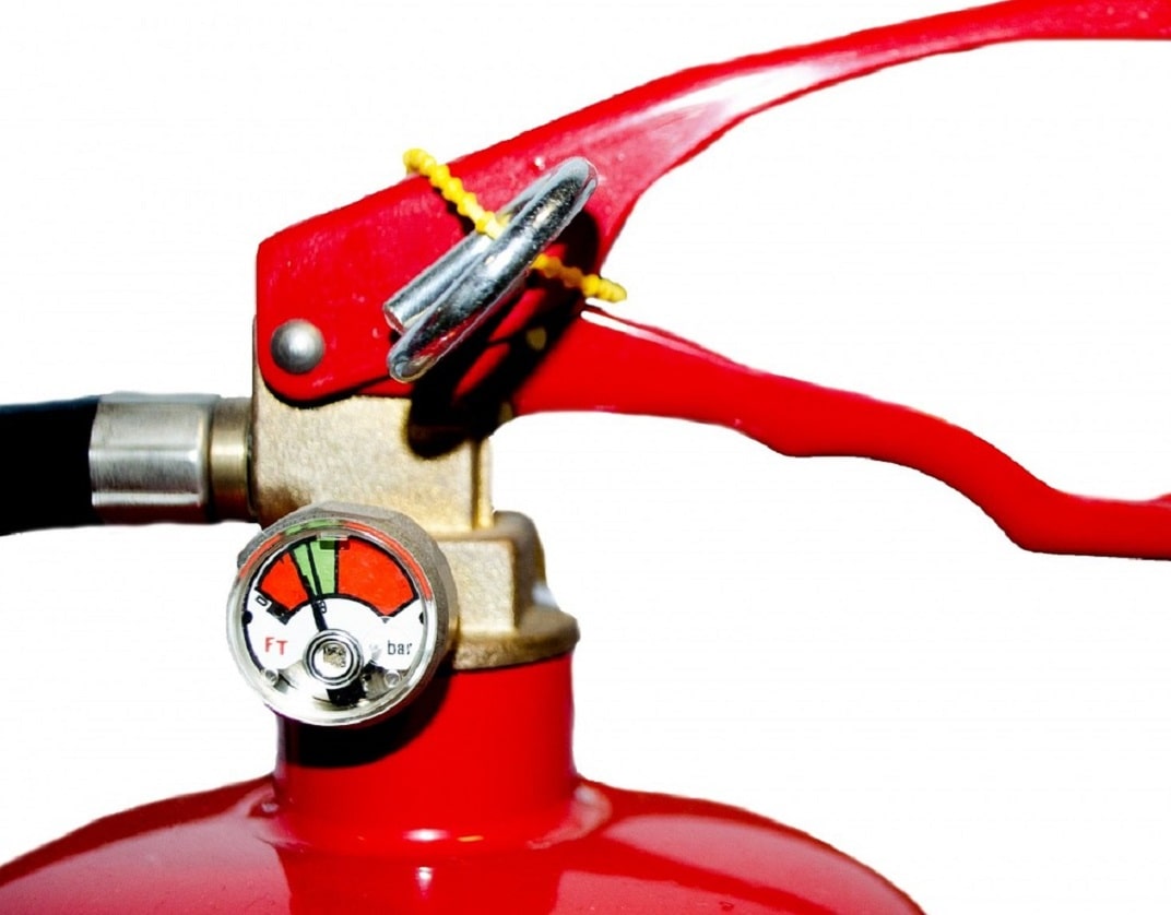 fire extinguishre pressure gauge, showing it just to be in usable range